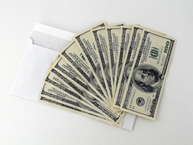 dollar bills related to making extra money